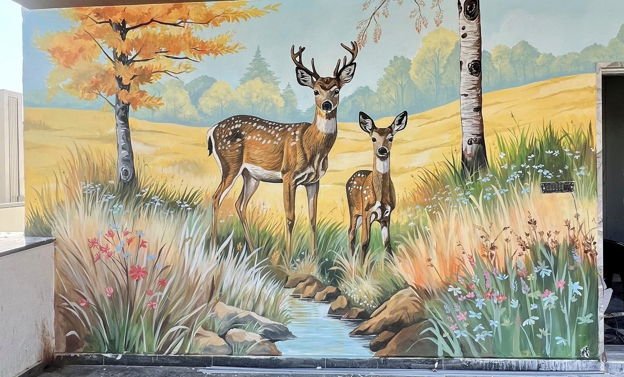 Panoramic landscape mural with deer and birch trees