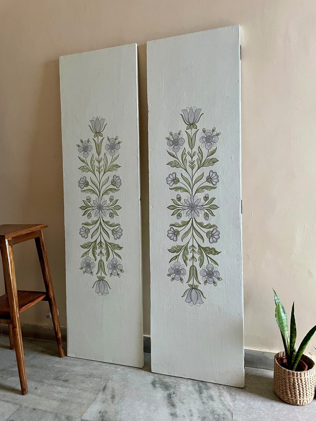 White carved floral panels